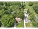 Aerial view of home, backyard, and surrounding greenery at 6110 Orinoco Ave, Indianapolis, IN 46227