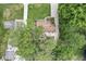 Well-maintained home featuring mature trees and landscaped yard at 6110 Orinoco Ave, Indianapolis, IN 46227