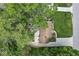 Well-maintained home featuring mature trees and landscaped yard at 6110 Orinoco Ave, Indianapolis, IN 46227