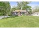 Lovely home with manicured front lawn and inviting front entrance at 6110 Orinoco Ave, Indianapolis, IN 46227