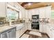 Well-equipped kitchen featuring modern appliances, ample counter space, and stylish backsplash at 6110 Orinoco Ave, Indianapolis, IN 46227