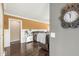 Cozy living room featuring hardwood floors, comfortable seating, and warm, inviting decor at 6110 Orinoco Ave, Indianapolis, IN 46227