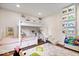 ' bedroom with a bunk bed, table, and fun decor, making it a cheerful room at 620 Meadows Dr, Mooresville, IN 46158