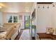 Inviting living room with wood-paneled ceiling, hardwood floors, and stylish decor at 620 Meadows Dr, Mooresville, IN 46158