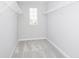 Spacious walk-in closet with carpet flooring and ample shelving for organized storage at 6421 Springtide Ct, Plainfield, IN 46168