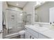 Modern bathroom with a tiled shower, sleek vanity, and neutral color scheme at 6465 Wasco Dr, Whitestown, IN 46075