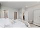 Comfortable bedroom with a neutral color palette and easy access to the bathroom and kitchen at 6465 Wasco Dr, Whitestown, IN 46075