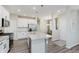Open kitchen features quartz countertops, stainless appliances, and a spacious island at 6465 Wasco Dr, Whitestown, IN 46075
