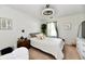 Bright bedroom with stylish ceiling fan, carpet, and cozy furnishings, creating a relaxing retreat at 6556 Wandering Way, Indianapolis, IN 46241
