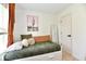 Bright bedroom featuring a daybed with storage and simple yet inviting decor at 6556 Wandering Way, Indianapolis, IN 46241