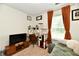 Well-lit bedroom showcasing a desk, daybed, and modern decor at 6556 Wandering Way, Indianapolis, IN 46241