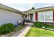 Charming front porch with seating, decorative plants, and a walkway leading to the entrance at 6556 Wandering Way, Indianapolis, IN 46241