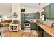 Functional kitchen design with ample cabinet space, and stainless steel appliances at 6556 Wandering Way, Indianapolis, IN 46241