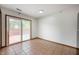Bright dining area with tile flooring and sliding glass door access to outdoor space at 6715 Wandering Way, Indianapolis, IN 46241