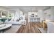 Spacious living area with hardwood floors, an open layout, and contemporary decor at 6833 Jacone Dr, Brownsburg, IN 46112