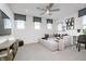 Cozy living room with modern decor, a comfortable sectional sofa, and plenty of natural light at 6833 Jacone Dr, Brownsburg, IN 46112