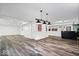 Finished basement with recessed lights, drop lighting, and a stylish bar area at 7056 E 171St St, Noblesville, IN 46062