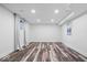 Spacious basement with recessed lighting, LVP flooring and large window at 7056 E 171St St, Noblesville, IN 46062