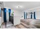Open basement design with bar and modern lighting plus LVP flooring at 7056 E 171St St, Noblesville, IN 46062