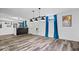 Large finished basement with drop lighting, bar area, and LVP flooring at 7056 E 171St St, Noblesville, IN 46062