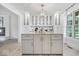 A bright and open kitchen featuring an island with white cabinets and granite countertops at 7056 E 171St St, Noblesville, IN 46062