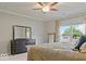 Bedroom featuring a black dresser and view of the backyard at 7242 Blue Ridge Dr, Noblesville, IN 46062