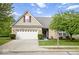 Charming single-Gathering home with well-maintained lawn, mature trees, and a two-car garage at 7242 Blue Ridge Dr, Noblesville, IN 46062