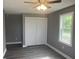 Bedroom with hardwood floors, closet, and natural light from window at 732 W 700 N, Fortville, IN 46040