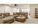 Finished basement with a large sectional sofa, soft carpet, and ample space for relaxation or entertainment at 747 Tuxedo Dr, Westfield, IN 46074