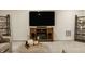 Basement media space with a fireplace, large television, and comfortable seating for Gathering entertainment at 747 Tuxedo Dr, Westfield, IN 46074
