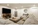 Cozy basement featuring a comfortable sectional, entertainment area, and a relaxed, inviting atmosphere at 747 Tuxedo Dr, Westfield, IN 46074