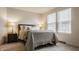 Calm bedroom with a cozy bed, soft lighting, and a serene atmosphere, ideal for rest and relaxation at 747 Tuxedo Dr, Westfield, IN 46074