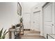 Bright foyer featuring modern decor, light hardwood floors, and ample closet space at 747 Tuxedo Dr, Westfield, IN 46074