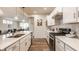 Bright kitchen featuring white cabinets, stainless steel appliances, and a quartz countertop island at 747 Tuxedo Dr, Westfield, IN 46074