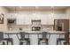 Bright kitchen with a large island, white cabinets, and stainless steel appliances at 747 Tuxedo Dr, Westfield, IN 46074