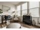 Bright sunroom featuring stylish chairs, a modern accent cabinet, and ample natural light at 747 Tuxedo Dr, Westfield, IN 46074