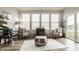 Bright sunroom with natural light, stylish seating, modern decor, and a view of the outdoors at 747 Tuxedo Dr, Westfield, IN 46074