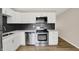 Well-equipped kitchen featuring stainless steel appliances and a sink at 7625 E 35Th St, Indianapolis, IN 46226
