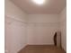 Walk-in closet with carpet floor and shelving at 808 Heartland Ln, Brownsburg, IN 46112