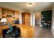 Bright home office features built-in desk, cabinets, and ample storage for a productive workspace at 808 Heartland Ln, Brownsburg, IN 46112