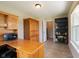 Well-lit home office with built-in desk and storage, ideal for remote work or study at 808 Heartland Ln, Brownsburg, IN 46112