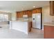 Spacious kitchen with an island offers plenty of room to maneuver and entertain guests at 808 Heartland Ln, Brownsburg, IN 46112