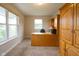 Functional office space with a built-in desk and cabinetry, ideal for working from home at 808 Heartland Ln, Brownsburg, IN 46112