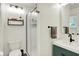 Bathroom featuring a shower, a mirror, and a floating vanity at 820 S Eaglewood Dr, Zionsville, IN 46077