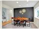 Stylish dining room with a wooden table, neutral walls, and ample natural light at 820 S Eaglewood Dr, Zionsville, IN 46077