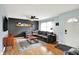 Comfortable living room with stylish decor, hardwood floors, and a large sectional couch at 820 S Eaglewood Dr, Zionsville, IN 46077