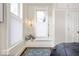Cozy bedroom nook with window seat, custom lighting, and hardwood floors at 847 N Park Ave, Indianapolis, IN 46202
