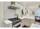 Modern kitchen featuring stainless steel appliances, stylish tile backsplash, and bright lighting at 847 N Park Ave, Indianapolis, IN 46202