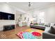 Bright living room boasts hardwood floors, recessed lights, and an open layout into the kitchen area at 847 N Park Ave, Indianapolis, IN 46202