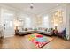 Spacious living room features hardwood floors, large windows, and stylish decor at 847 N Park Ave, Indianapolis, IN 46202